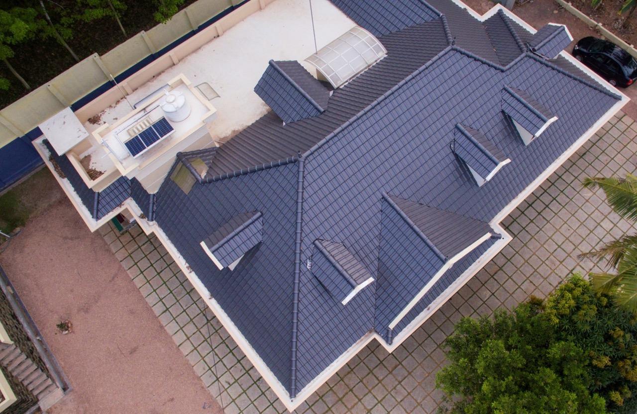 Home built with SEV clay roof tiles and blocks
